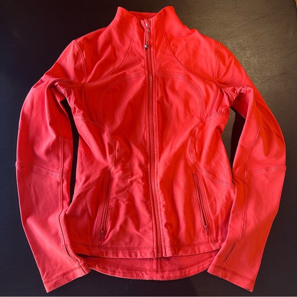 Red/orange lululemon zip up jacket, size 8